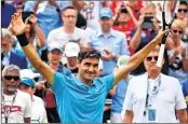  ??  ?? Switzerlan­d’s Federer celebrates after a win against Canada’s Raonic in the final at the ATP Mercedes Cup tennis tournament in Stuttgart.