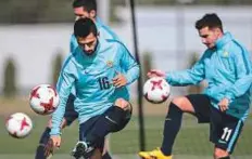  ?? AP ?? Australia’s Aziz Behich (left) attends a training session at the Spartak Stadium on Friday. Australia will play Chile today.