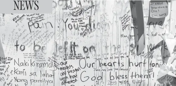  ?? PHOTOS: PETER J THOMPSON / NATIONAL POST ?? Personal notes of condolence are written on a wall on Yonge Street in Toronto for those killed and injured in Monday’s van rampage.