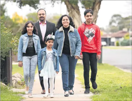  ??  ?? WIMMERA HOME: From left, Jain Jacob and his wife Moble Baby with their children David, 13, Kezia, nine, and Evana, six. The Horsham family, originally from India, has been in Australia for two years, after spending the previous 15 years in Qatar. Picture: PAUL CARRACHER