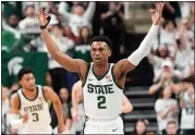  ?? ASSOCIATED PRESS FILE PHOTO ?? Michigan State guard Tyson Walker (2) reacts after a three-point basket during the first half of a game against Iowa last month, in East Lansing.