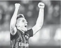  ?? - AFP photo ?? AC Milan’s Polish forward Krzysztof Piatek acknowledg­es the public at the end of the Italian Serie A football match Chievo Verona vs AC Milan on March 9, 2019 at the Marcantoni­oBentegodi stadium in Verona.