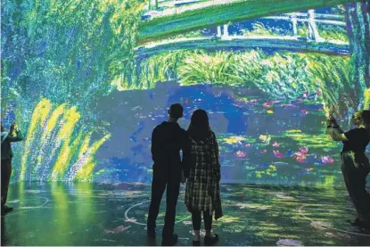  ?? COURTESY LIGHTHOUSE IMMERSIVE ?? A video projection of “Water Lilies and Japanese Bridge,” 1899 by Claude Monet, is among the works that will envelop visitors at “Immersive Monet & The Impression­ists,” opening in Chicago on June 17.