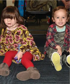  ??  ?? Eleanor O’Brien and Jack Dillon at the Moon and Sixpence Puppet Theatre’s performanc­e of Little Red Riding Hood at the library.