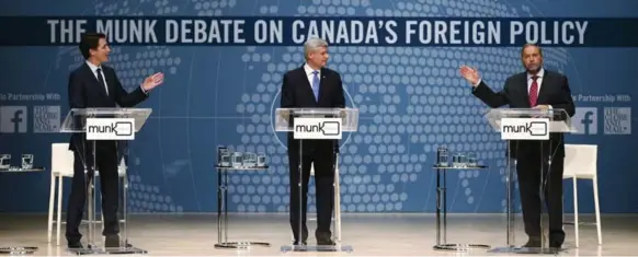  ?? MARK BLINCH/REUTERS ?? The three party leaders sparred over foreign policy at last night’s Munk debate, touting Canadian values rather that balanced budgets, Tim Harper writes.