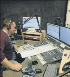  ??  ?? AT WORK Mark Coates making sure the AD commentary links to the Queen Alexandra Hospital radio