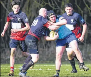  ?? Picture: Alan Langley FM4234258 ?? Ashford Barbarians try get to grips with Canterbury 4ths, light blue, on Saturday
