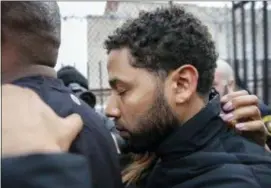  ?? KAMIL KRZACZYNSK­I — THE ASSOCIATED PRESS ?? “Empire” actor Jussie Smollett leaves Cook County jail following his release, Thursday in Chicago.