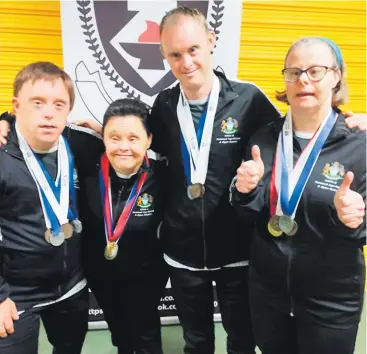  ?? ?? Sunfield’s table tennis stars (from left) Douglas Dryden, Brenda Houghton, Benjie Worrall and Leanne Jelf.