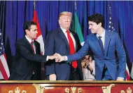  ?? PABLO MARTINEZ MONSIVAIS / THE ASSOCIATED PRESS ?? Former Mexican president Enrique Peña Nieto, left, U.S. President Donald Trump and Prime Minister Justin Trudeau participat­e in the USMCA signing ceremony, on Friday in Buenos Aires, Argentina.