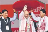  ?? PTI ?? ▪ BJP president Amit Shah is felicitate­d at a meeting of the party's booth workers in Guwahati on Saturday.