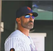  ?? Rich Schultz / Getty Images ?? Mets manager Mickey Callaway looks on from the dugout during a game against the Tampa Bay Rays at Citi Field on July 8.