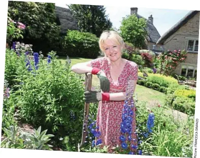  ??  ?? All things bright and beautiful: Winifred finds refuge in her garden