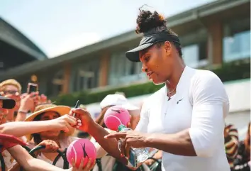  ?? Rex Features ?? Serena Williams signs autographs at the Aorangi Practice Courts yesterday. She says she’s very nervous about the competitio­n and how her body will react to the pressure.