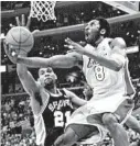  ?? VINCE BUCCI/AFP 2001 ?? Kobe Bryant (8) and Tim Duncan (21) are Basketball Hall of Fame finalists.