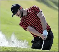  ?? AP/CHRIS O’MEARA ?? Kyle Stanley hits from the sand on the fifth hole in the second round of the Players Championsh­ip at Ponte Vedra, Fla. Stanley and Louis Oosthuizen have a two-shot lead after both shot a 6-under 66 Friday.