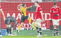  ?? AFP ?? Wolves’ Joao Moutinho, second left, celebrates his goal against Man United.