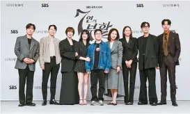  ?? Courtesy of SBS ?? From left, actors Lee Joon, Um Ki-joon, Hwang Jung-eum, Lee Yu-bi, director Oh Joon-hyuk, actors Shin Eun-kyung, Jo Yoonhee, Yoon Jong-hoon, and Lee Jung-Shin pose during the press conference for the new thriller series “The Escape of The Seven: Resurrecti­on,” held at SBS headquarte­r in Yangcheon District, Seoul, Wednesday.
