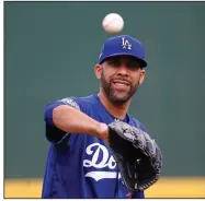  ?? (AP/Ross D. Franklin) ?? Los Angeles Dodgers pitcher David Price is one of several high-profile players who are returning to major league baseball this season after opting out of the 2020 season because of the coronaviru­s pandemic.