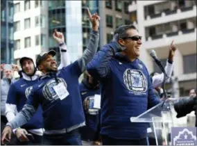  ?? THE ASSOCIATED PRESS ?? Villanova head coach Jay Wright, right, gestures as fans chant during a rally celebratin­g his team’s NCAA college basketball championsh­ip, Thursday in Philadelph­ia. Villanova defeated Michigan on Monday for the NCAA men’s basketball title.