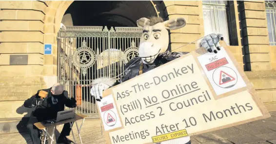  ??  ?? Protest
The donkey is protesting about no online access to the public or press to attend South Ayrshire Council meetings