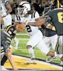  ?? Daily Citzen-News ?? Rockmart’s Javin Whatley (2) makes his way through a group of North Murray defenders during Friday’s Region 6-3A game in Chatsworth.