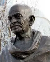  ??  ?? Left to right: George Bernard Shaw, Nellie McClung, and a statue of Mohandas K. Gandhi outside of the Canadian Museum for Human Rights in Winnipeg. Shaw and McClung supported eugenics, while Gandhi was accused of anti-black racism.