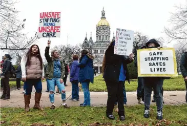  ?? Arnold Gold/Hearst Connecticu­t Media file photo ?? CT United Nurses rally for safe staffing in front of the Capitol building in Hartford before the inaugurati­on of Ned Lamont on Jan. 4, 2023.