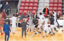  ?? COURTESY OF CAMERON GOELDNER ?? This picture was taken moments after a scuffle began between New Mexico State players and UNM players before their game Tuesday night in Las Cruces.