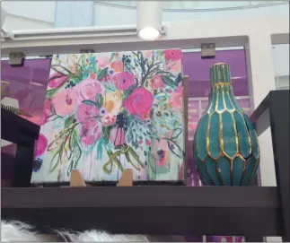  ?? GARY PULEO - MEDIANEWS GROUP ?? Wayfair’s familiar brand of art is among the merchandis­e available at the new Wayfair pop-up shop at King of Prussia Mall.