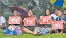  ?? Picture: REINAL CHAND Picture: REINAL CHAND ?? Fans brave the rain at Prince Charles Park in Nadi yesterday.
Bottom: Fans brave the rain to watch the Fijian Drua v Melbourne Rebels trial match.