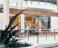  ?? JUSTIN T. GELLERSON THE NEW YORK TIMES FILE PHOTO ?? Louis Vuitton, LVMH’s biggest brand, reported a slowdown in sales from Chinese shoppers during the third quarter.