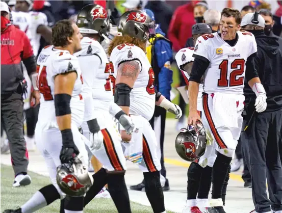  ?? CHARLES REX ARBOGAST/ AP ?? Tom Brady yells at members of his offensive line in the second half Thursday night. He failed to defeat the Bears for the first time in six career meetings.