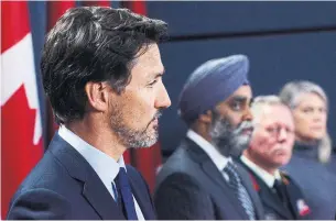  ?? SEAN KILPATRICK THE CANADIAN PRESS ?? Prime Minister Justin Trudeau said Wednesday that Canada plans to continue its military missions in Iraq following the recent increase in tensions between the U.S. and Iran.