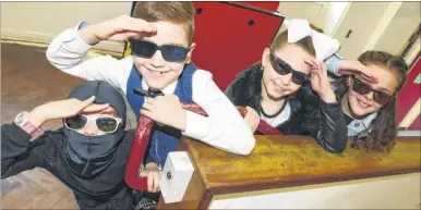  ?? Picture: Andy Payton FM4641468 ?? From left, Katie, nine, Adam, 10, Connie, nine, and Isla, 10, take part in a spy day, solving puzzles as secret agents at Loose Primary School