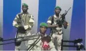  ?? Reuters ?? Lt Kelly Ondo Obiang addresses citizens of Gabon from a radio station in Libreville