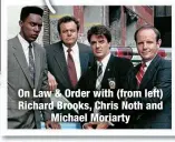  ?? ?? On Law & Order with (from left) Richard Brooks, Chris Noth and
Michael Moriarty