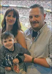  ?? CONTRIBUTE­D ?? Isabel with husband Lang Whitaker and their son Beck at Yankee Stadium in 2017.