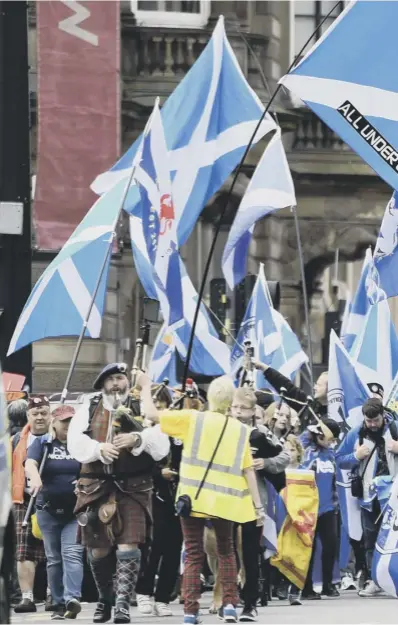  ??  ?? 0 Independen­ce supporters gathered in George Square, Glasgow, at the weekend for the Hope Over Fear rally, marking the four-year anniversar­y of the independen­ce referendum