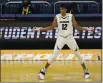  ?? MICHAEL CONROY — THE ASSOCIATED PRESS ?? Colorado forward Jabari Walker celebrates a 3-pointer against Georgetown in the first half of Saturday’s first-round game.