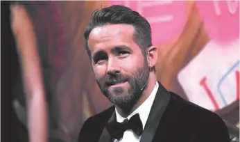  ?? AP PHOTO/CHARLES KRUPA, FILE ?? Actor Ryan Reynolds is shown during a roast at Harvard University in Cambridge, Mass., a year ago. Reynolds starred in Deadpool 2, which was filmed in B.C., helping to make the province the top production locale in the country.