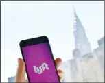  ??  ?? In this file photo taken on June 29, 2018,the Lyft transport applicatio­n is seen on a smart phone in New York City. Ride-hailing firm Lyft on Dec 6, 2018, launched the process to take the company public with astock offering. (AFP)