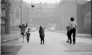  ??  ?? Unsentimen­tal … children play on a Glasgow street. Photograph: Trinity Mirror/Mirrorpix/Alamy