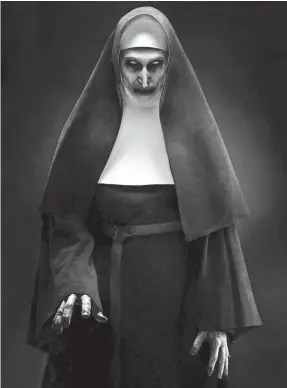  ??  ?? Bonnie Aarons brings unholy terror as “The Nun.”