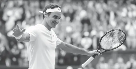  ?? GARETH FULLER/AFP/GETTY IMAGES ?? Swiss tennis legend Roger Federer celebrates after beating Tomas Berdych in their Wimbledon semifinal in London on Friday. He will make his 29th appearance in a Grand Slam final and 11th appearance in a Wimbledon final, extending two records he holds....