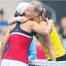  ??  ?? Barty and Bertens embrace after the hard-fought match.