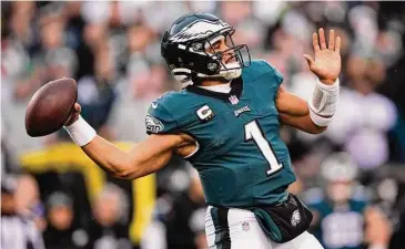  ?? Matt Rourke/Associated Press ?? Philadelph­ia Eagles quarterbac­k Jalen Hurts passes during the first half of the NFC Championsh­ip game between the Philadelph­ia Eagles and the San Francisco 49ers on Jan. 29 in Philadelph­ia.