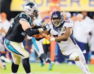  ?? GREGORY PAYAN/THE ASSOCIATED PRESS ?? Denver’s Von Miller, right, tries to get by Carolina tackle Mike Remmers during Super Bowl 50. Miller was named MVP of the game.