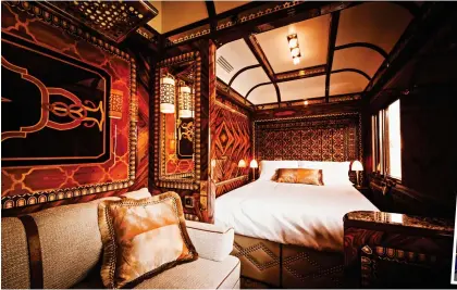  ?? ?? First-class: A sumptuous bedroom on the Venice Simplon-Orient-Express, seen (inset) going through the Brenner Pass in Austria
