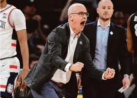  ?? Frank Franklin II/Associated Press ?? UConn head coach Dan Hurley reacts during Thursday’s Big East quarterfin­al win over Xavier in New York.